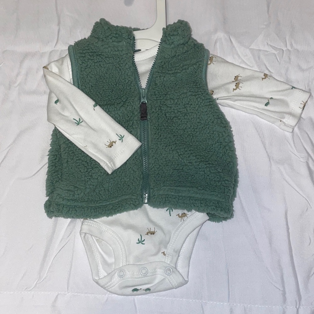 Never worn Baby Onsie and Vest